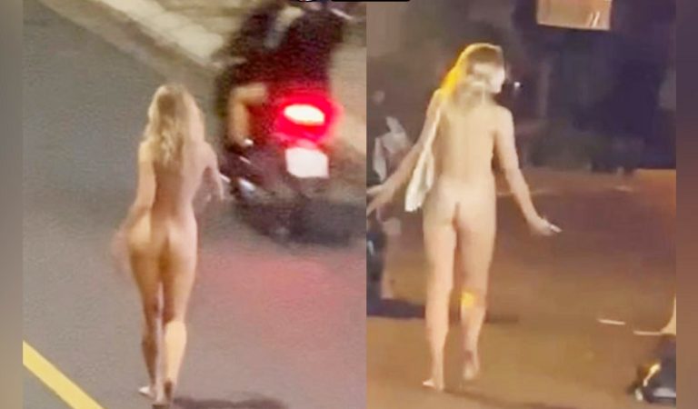 Gái Tây ngáo đá khoả thân đi dạo trên đường phố Hà Nội